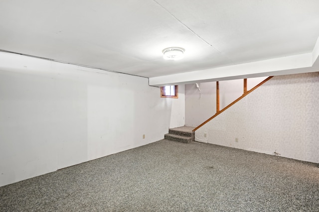 basement with carpet flooring