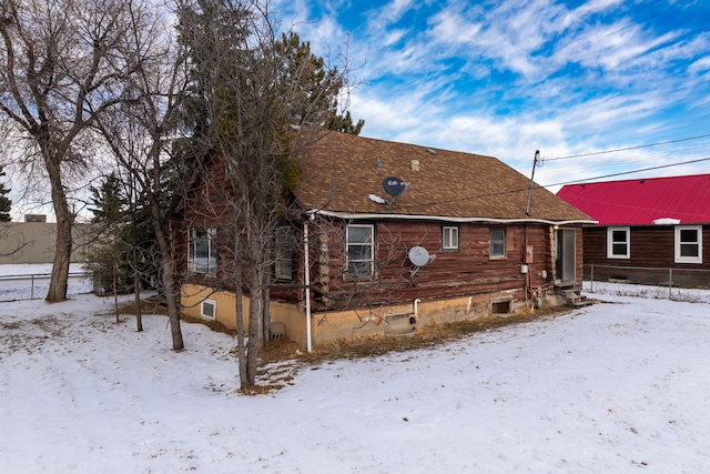 view of snow covered property