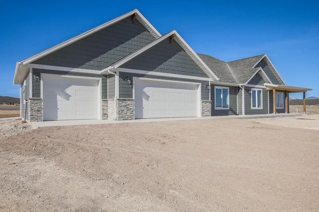 craftsman-style home with a garage