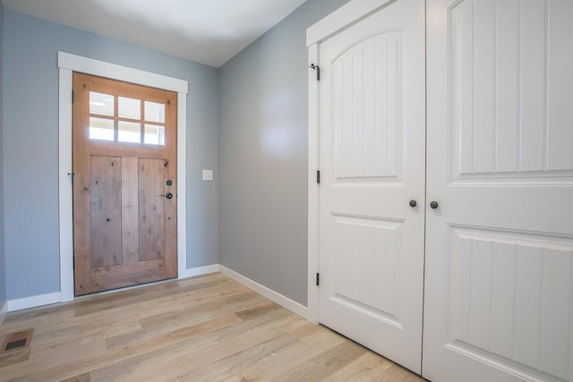 entrance foyer featuring light hardwood / wood-style floors