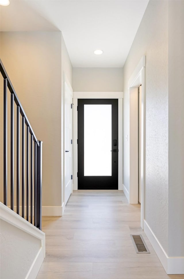 interior space with light hardwood / wood-style floors