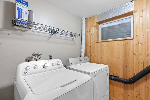 laundry room with washing machine and clothes dryer