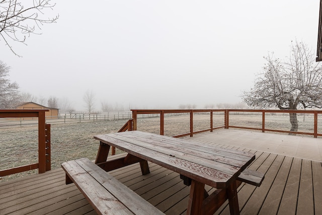 wooden terrace with a rural view