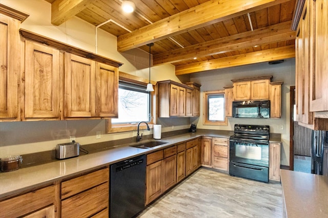 kitchen with black appliances, sink, a wealth of natural light, and beamed ceiling