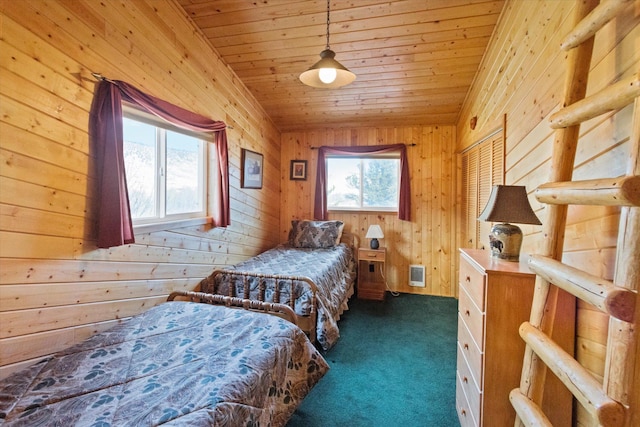 unfurnished bedroom with wooden walls, wood ceiling, and dark colored carpet