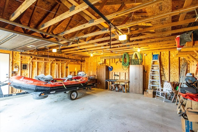 garage featuring a garage door opener