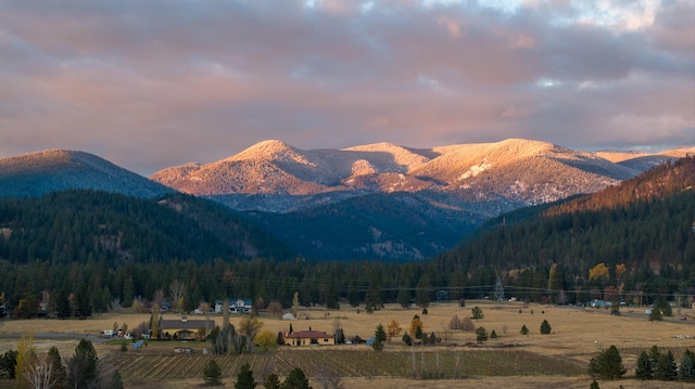 property view of mountains featuring a rural view