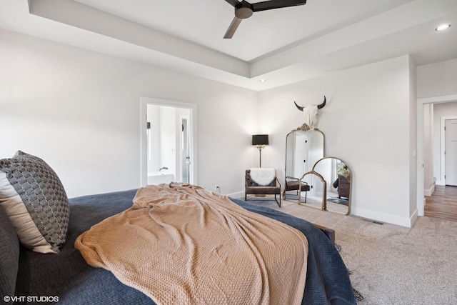 bedroom featuring ceiling fan and light carpet