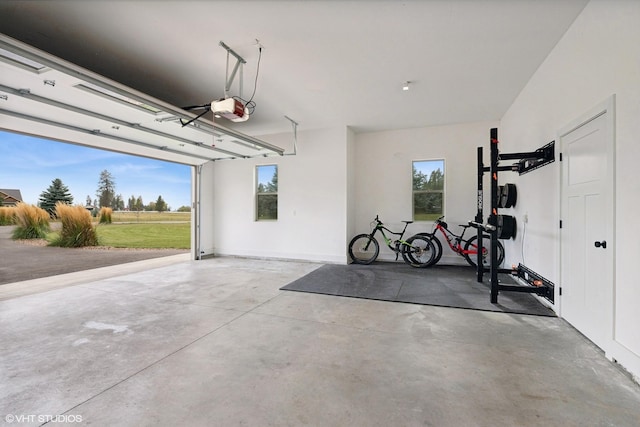 garage featuring a garage door opener