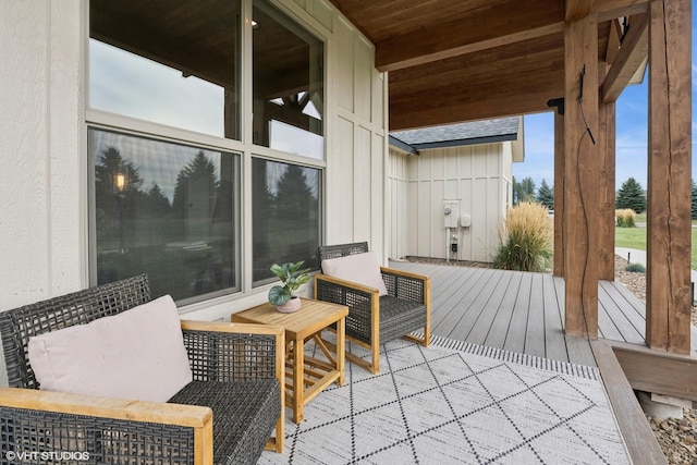 wooden balcony featuring a deck