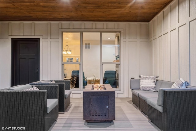 505 Sweetgrass Ranch Rd, Kalispell, MT 59901 - wooden deck featuring an outdoor living space with a fire pit and a grill