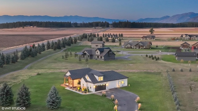 aerial view at dusk with a mountain view