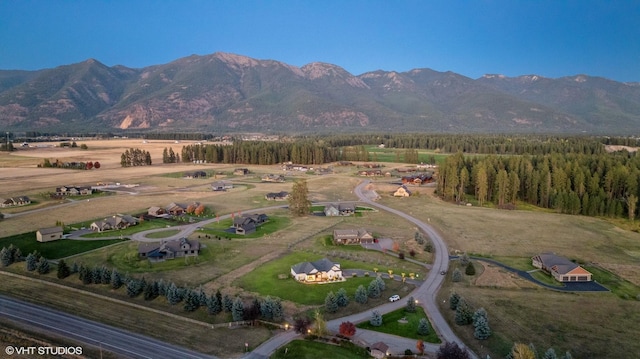 drone / aerial view featuring a mountain view