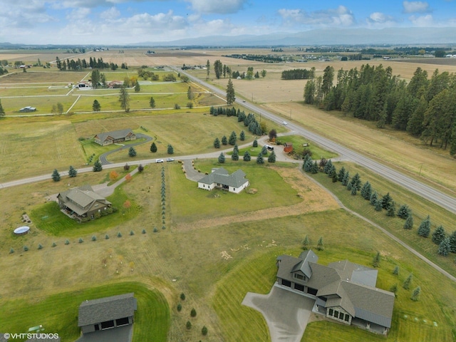 birds eye view of property featuring a rural view