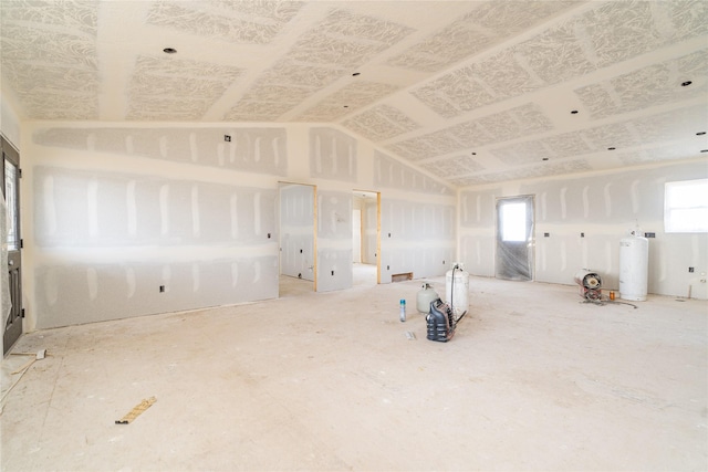 miscellaneous room with lofted ceiling