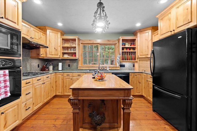 kitchen with black appliances, under cabinet range hood, open shelves, and light brown cabinetry