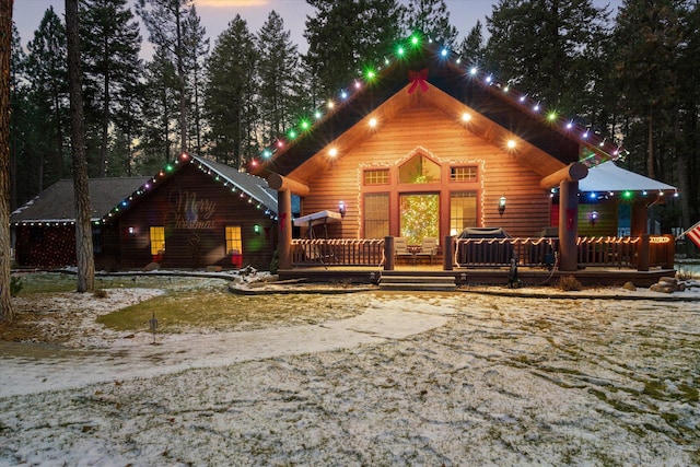 view of front of house featuring a wooden deck