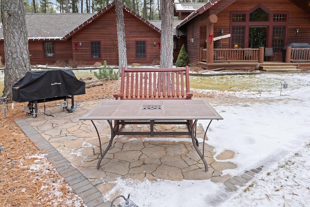 view of patio with a grill