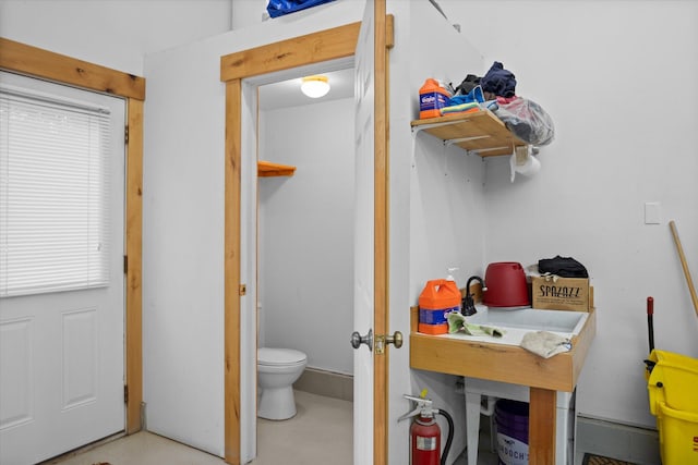 bathroom featuring toilet