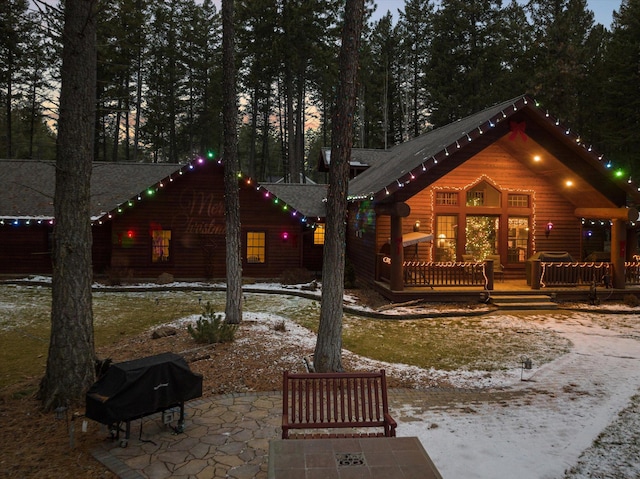 back of house with a patio and a wooden deck