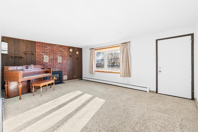 office with light carpet, a brick fireplace, and baseboard heating