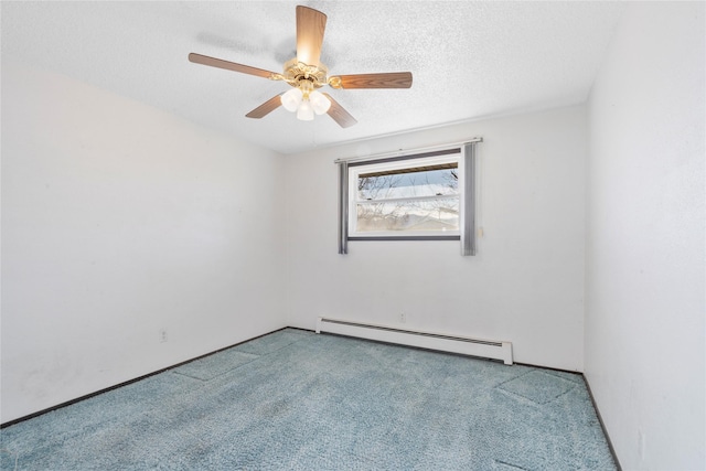 spare room with a baseboard radiator, ceiling fan, a textured ceiling, and light colored carpet