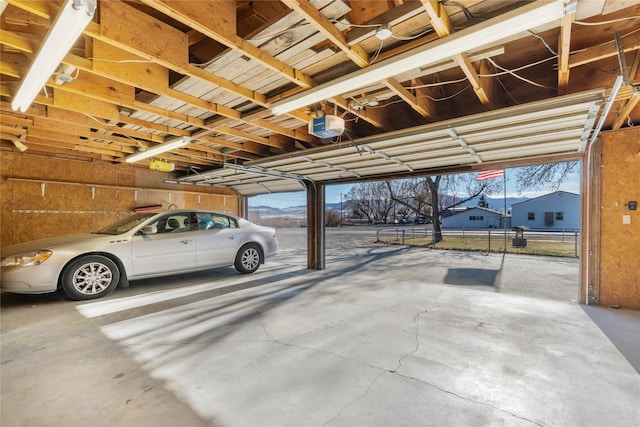 garage featuring a garage door opener