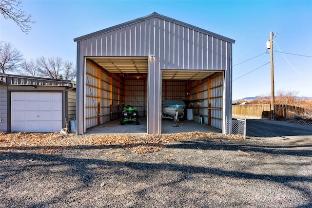 garage with fence