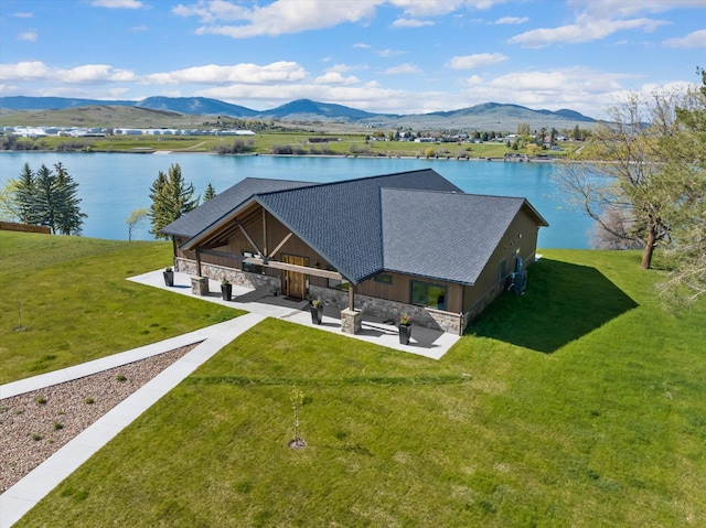 aerial view with a water and mountain view