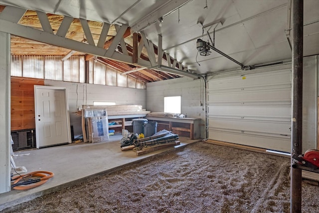 garage featuring a garage door opener