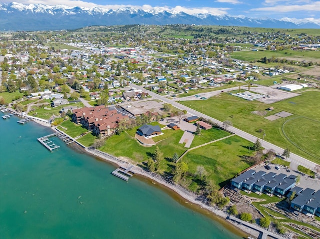 bird's eye view featuring a residential view and a water and mountain view