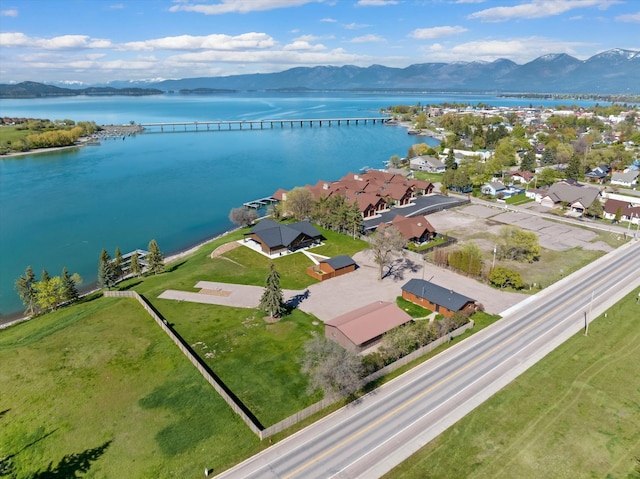 aerial view featuring a residential view and a water and mountain view