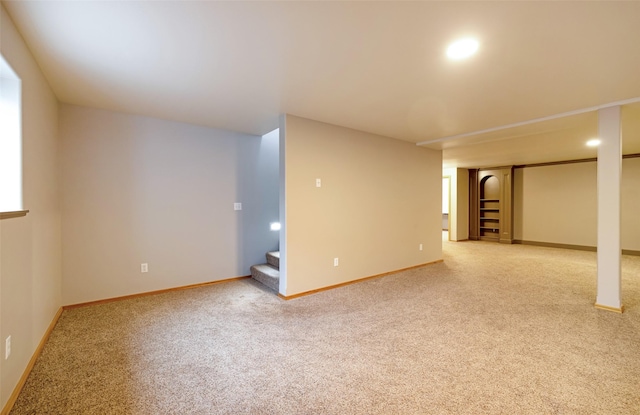 basement with carpet flooring