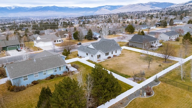 birds eye view of property featuring a mountain view