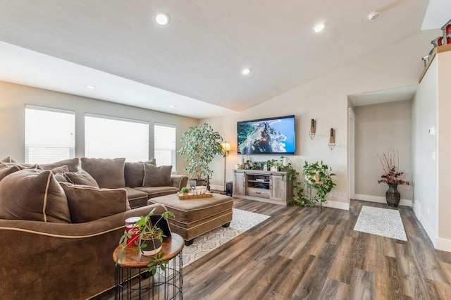 living room featuring dark hardwood / wood-style floors and lofted ceiling