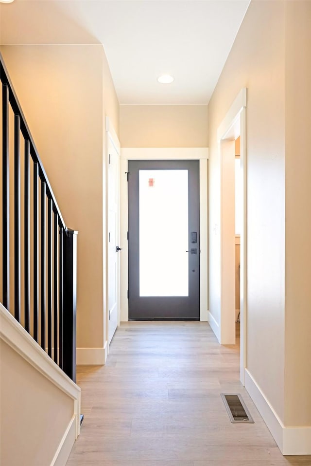 interior space with light hardwood / wood-style flooring