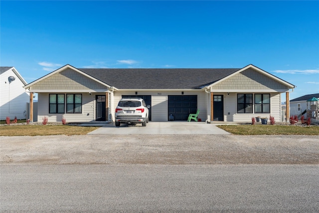 ranch-style home with a garage