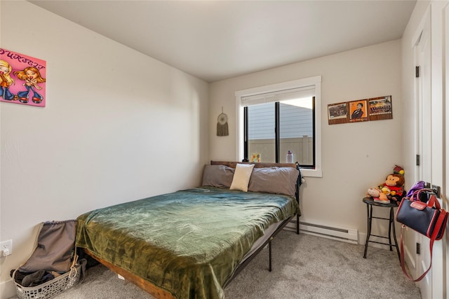 carpeted bedroom with baseboard heating