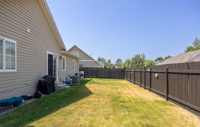 view of yard featuring central AC unit