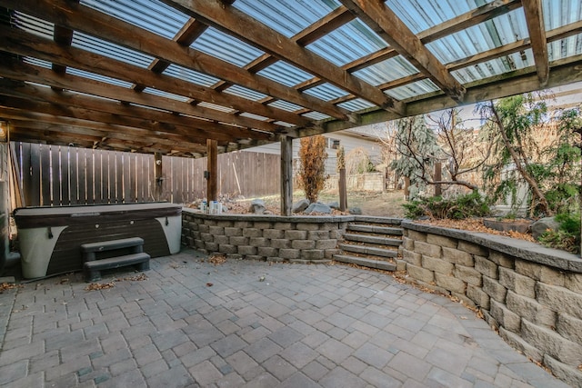 view of patio featuring a hot tub