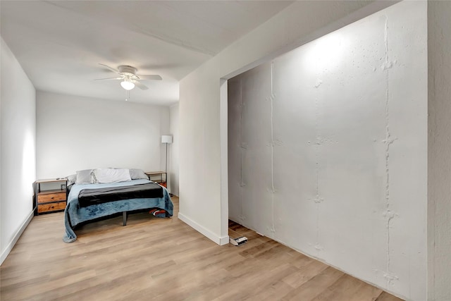 bedroom featuring ceiling fan and light wood-type flooring