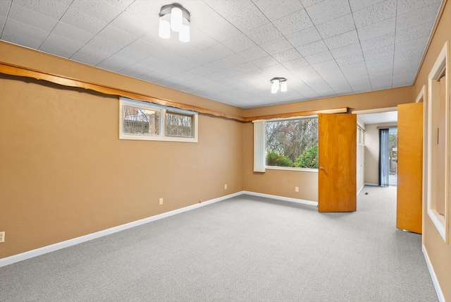 444 S Meridian Rd, Kalispell, MT 59901 - spare room featuring carpet flooring and baseboards
