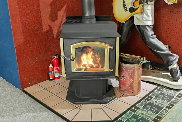 444 S Meridian Rd, Kalispell, MT 59901 - detailed view of a wood stove and a fire extinguisher