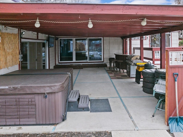 444 S Meridian Rd, Kalispell, MT 59901 - view of patio / terrace featuring a hot tub, a pergola, outdoor dining space, and grilling area