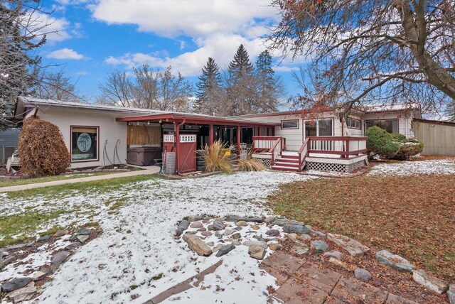 444 S Meridian Rd, Kalispell, MT 59901 - view of front of home featuring a deck