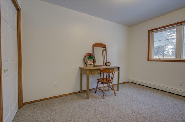 carpeted office featuring a baseboard radiator