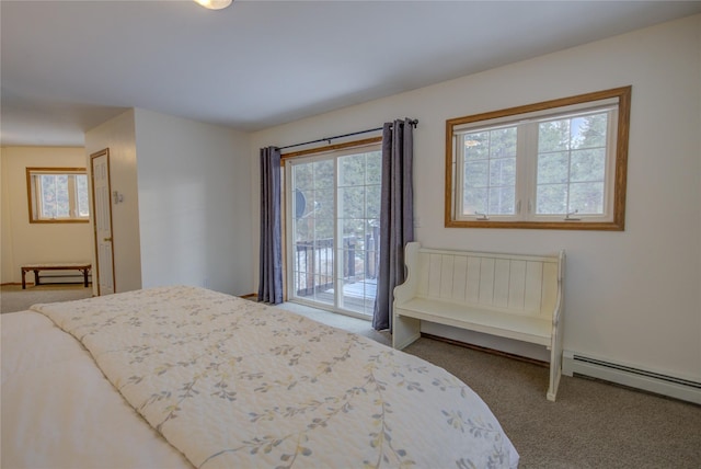 bedroom featuring access to outside, carpet floors, and a baseboard heating unit