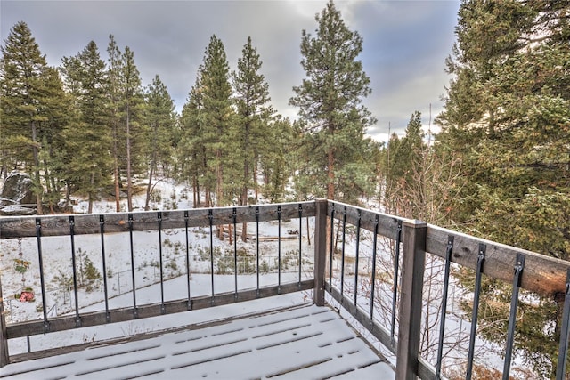 view of snow covered deck