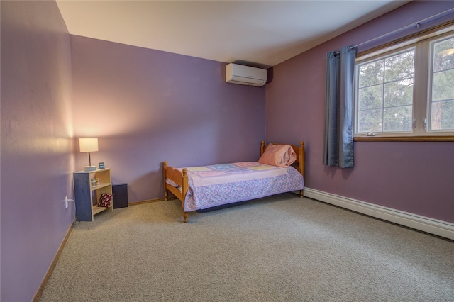 carpeted bedroom with baseboard heating and a wall mounted air conditioner