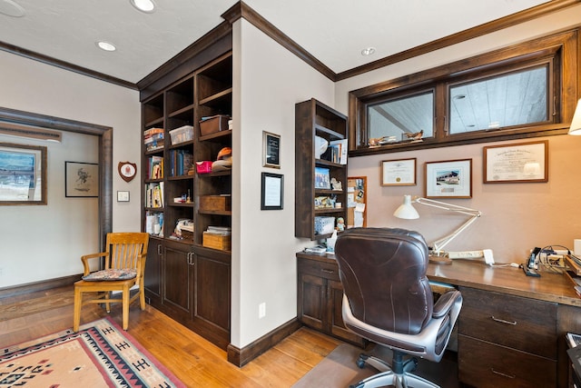 office area featuring crown molding and light hardwood / wood-style floors